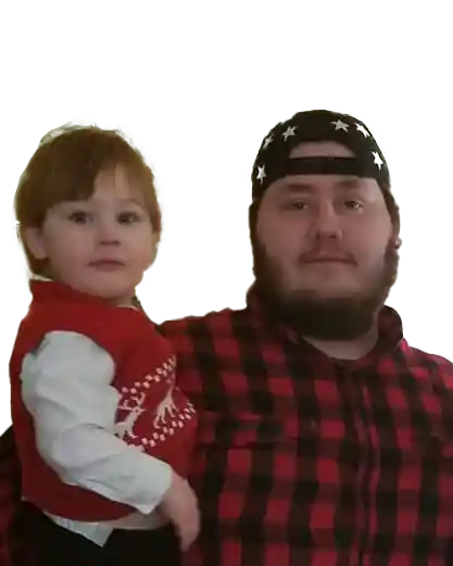 Simple Improvised Co-Founder Kevin Holding a child
